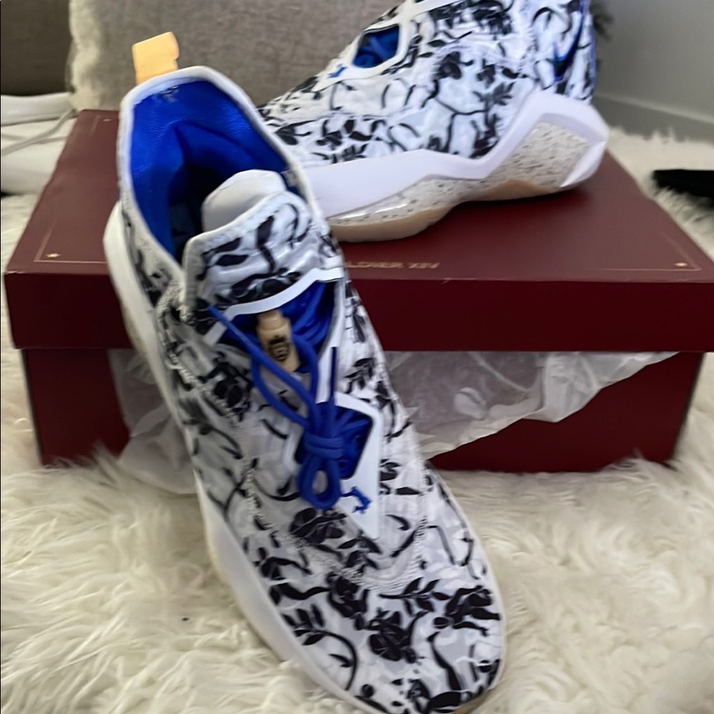 Stylish Black and White Sneakers with Blue Accents